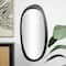 51" Black Wooden Abstract Oval Framed Wall Mirror